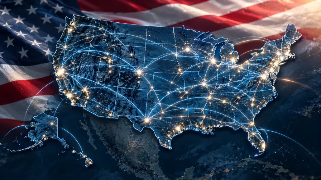 United States map at night with glowing network lines and bright city lights, enhanced by a waving American flag backdrop