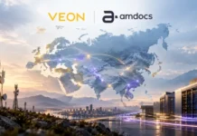 VEON and Amdocs Enter 10-Year Telecom Technology Agreement Global network map over a city skyline at sunset, with VEON and amdocs branding above.
