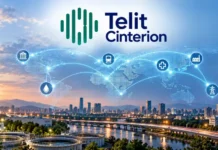 Telit Cinterion and Commstar Radio Expand Multi Network Connectivity Telit Cinterion logo over a world map with glowing IoT connectivity icons above a city at dusk.